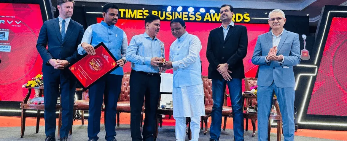 Jupiter's President receiving the Times award for Jupiter Public School from Odisha Chief Minister Mohan Majhi